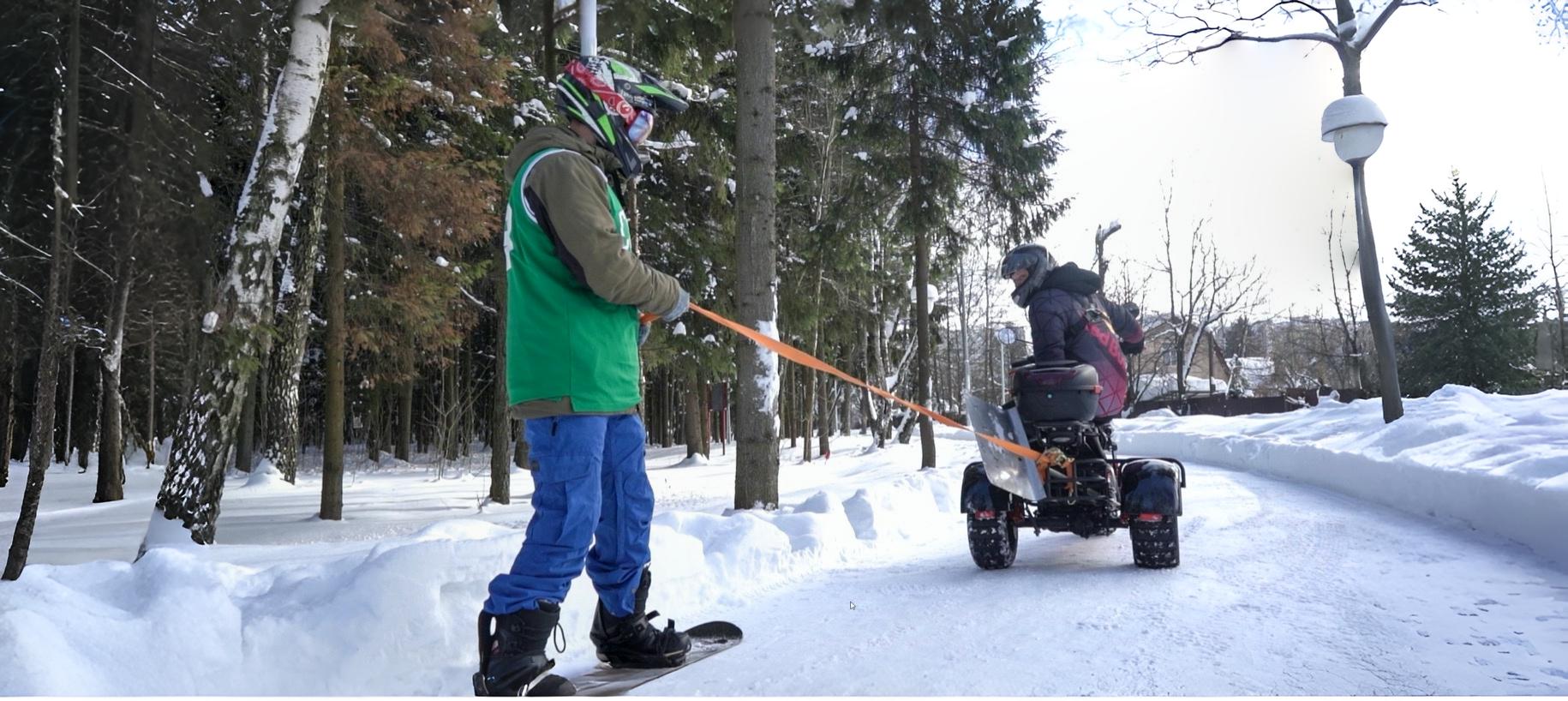 WS-Trike 3000W тянет сноубордиста по снегу